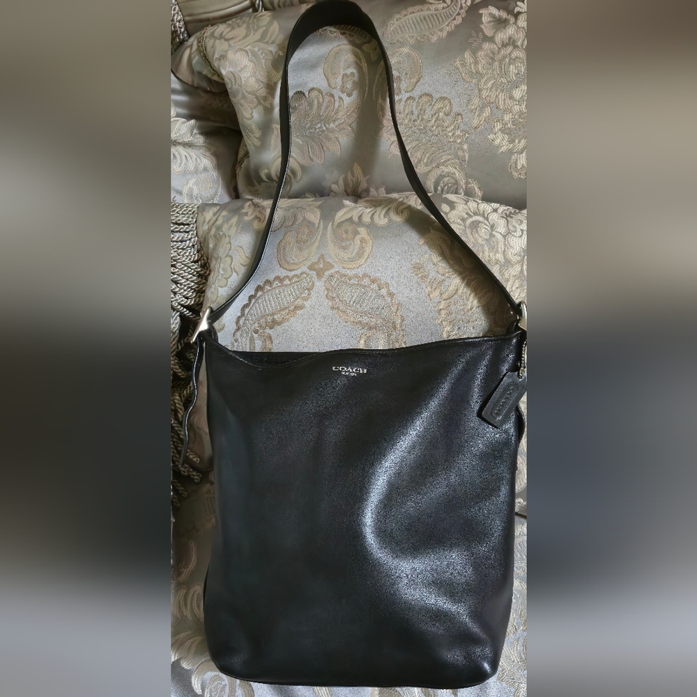 Coach Legacy bucket duffle in black fine grain leather silver hardware